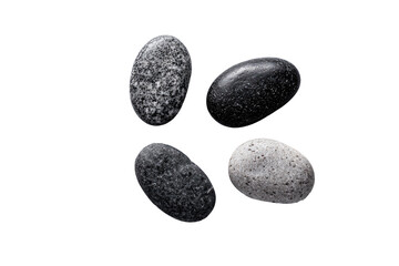 Four smooth, oval-shaped stones, various shades of gray and black, arranged in a loose, symmetrical pattern against a pure black background