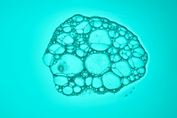 Beautiful soap bubbles of detergent or shower gel.