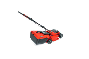 Lawn mower rear view. Rear view of a red cordless lawn mower with a large grass catcher isolated on...