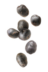 Fresh purple potatoes falling on white background