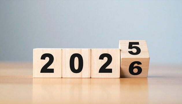 Wooden cube blocks showing 2025 changing to 2026. Countdown calendar. New Year. Fresh start
