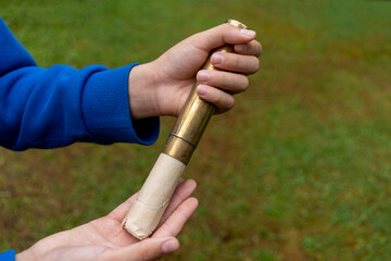 An antique note in a brass tube.The message of the ancestors.A time capsule.A hidden map.