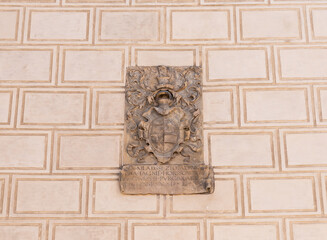 Stone coat of arms on wall in the Prague Castle in Prague in the Czech Republic