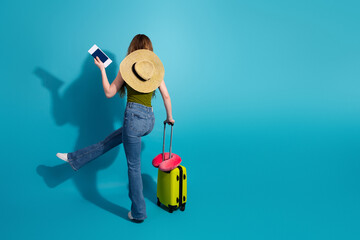 Young Female Traveler with Suitcase and Hat Enjoying Leisure Vibrant Background