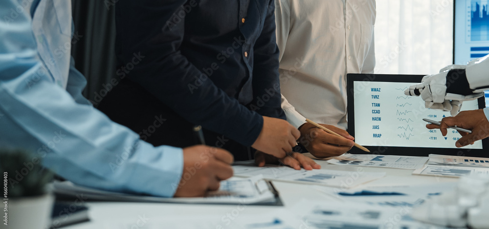 Poster a dynamic scene capturing business professionals collaborating in an office with advanced technology