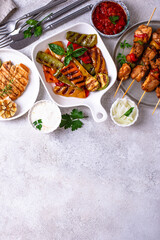 Assortment of grilled bbq meat and vegetables