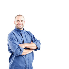 Fototapeta premium Smiling mechanic wearing blue coveralls with arms crossed confidently isolated on transparent background