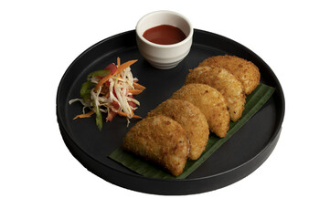 Mushroom rissóis served on banana leaf in a black plate with sauce and salad, isolated on transparent background, perfect for gourmet menus, Portuguese snacks, fusion cuisine, and culinary projects.