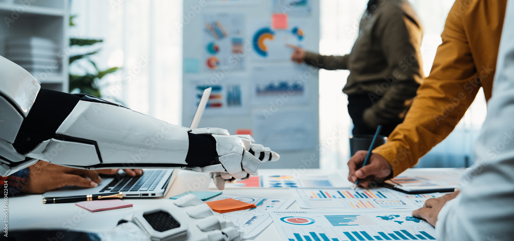 Poster a futuristic workspace showcasing a robot hand assisting in collaborative data analysis. professiona