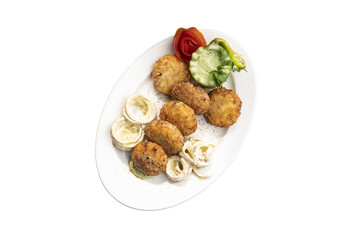 Crispy falafel balls served with fresh salad, creamy hummus, and cucumber dip on a white plate, isolated for Mediterranean cuisine, healthy meals, and stock food projects.