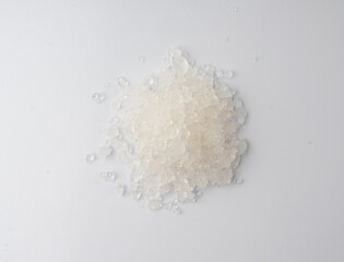 Dead sea salt pile, white crystals for body spa, sodium chloride similar to crushed ice, spa scrub