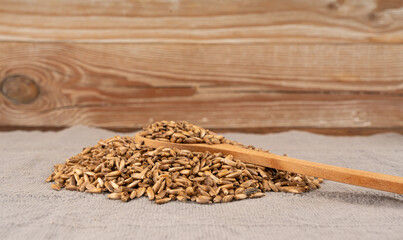 Milk thistle seeds, silybum marianum grains, dry blessed milkthistle fruits, variegated thistle kernels