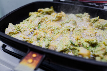 Delicious green bean casserole with cream of mushroom soup, bubbly and golden, perfect for holiday...