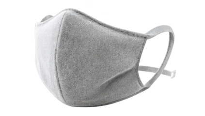 Close-up of a gray, cloth face covering with ear loops, isolated on black