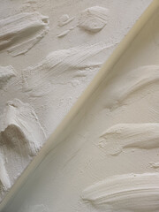 Plaster coating on the wall. Rough decorative plaster