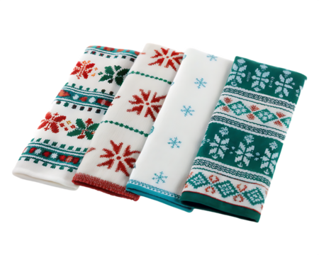 Four Folded Christmas Towels with Snowflake and Geometric Patterns kitchen textile isolated on a transparent background