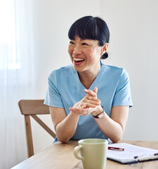 Portrait of a doctor or nurse and  health care worker at home or nursing home or hospital or clinic