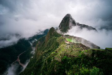 Aerial view of Machu Picchu in the morning fog, Cuzco, Peru