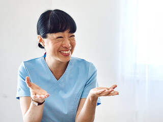 Portrait of a doctor or nurse and  health care worker at home or nursing home or hospital or clinic