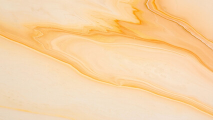 Abstract flowing liquid art with soft peach and gold marbling effect
