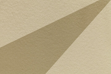 Abstract old geometric beige paper background with brown rays, macro texture for banner, template, presentation