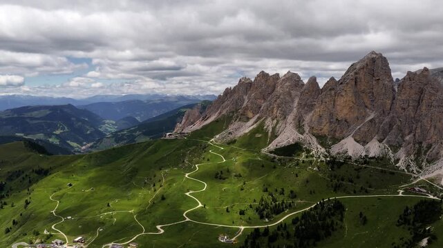 Cinematic Aerial Flyover Toward Cirspitzen Ridge in the Italian Alps on a Cloudy Day