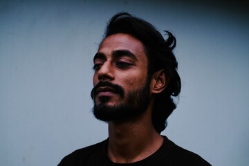 Handsome young adult with close face expression 