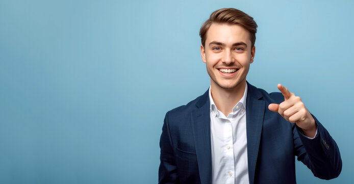 Young business caucasian man smiling and pointing aside, showing something at blank space. young man with a friendly and confident demeanor. He is wearing a dark blue. copy space - Powered by Adobe