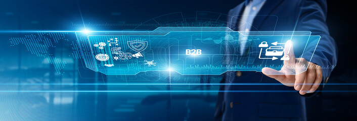 Businessman touching B2B on digital screen, business partnership, corporate network, client...