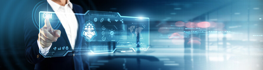 Businessman touching CRM on digital screen. customer relationship, data management, personalized...