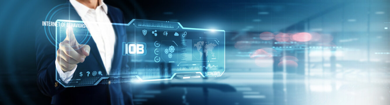 Businessman touching IOB on digital screen. data analytics, behavioral insights, digital tracking, customer profiling, personalized marketing, smart decision-making, predictive intelligence