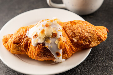 Croissant almond freshly baked sweet dessert tasty snack fresh delicious gourmet food background on the table  rustic food top view copy space