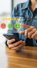 Person giving a rating on a smartphone with customer feedback interface review mobile