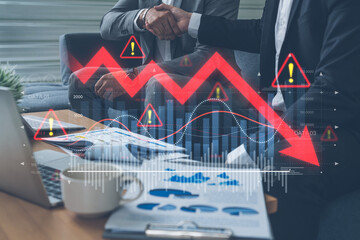 Economic caution visualized with fluctuating market graph, alert symbols, and negative data trends....