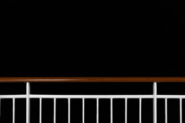 Ferry fencing in the dead of night. The surrounding darkness and quiet sea evoke a sense of...