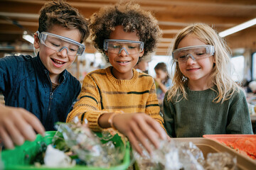 Students engage in sorting recyclables during an educational workshop at school
