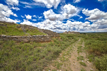 At Gran Quivira, you'll see unique grey San Andres limestone ruins of two mission churches, as well as excavated pueblo structures.
