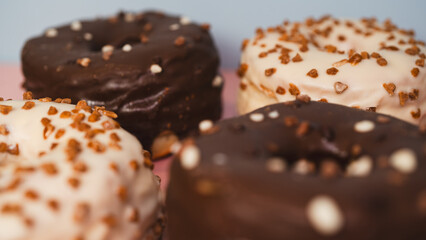 A vibrant selection of assorted donuts with various toppings and glazes, perfect for bakeries, cafés, or dessert promotions. Professional food photography with bright lighting