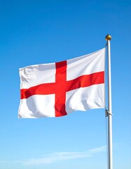 Flag waving in clear blue sky