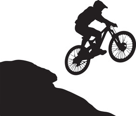 Obraz premium Mountain biker jumping from rock formation silhouette