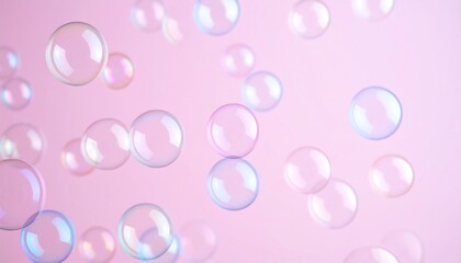 Floating soap bubbles on pink