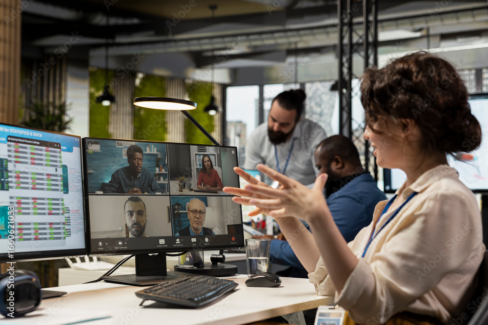 Aufkleber partners meeting on web conference call to discuss allocation of resources, engaging in a business c