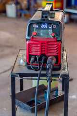 Inverter welding machine. Equipment for welding metals in an automobile workshop