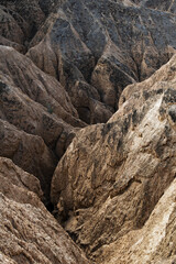 Breathtaking Kazakh canyon with fiery rock layers and dramatic erosion-carved contours.