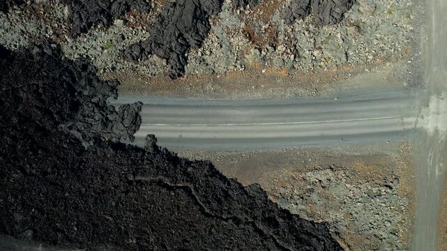 Iceland Grindavik Road Surrounded and Covered by Fresh Black Lava Top Down View 4K 60fps