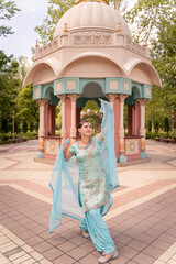 Woman Dancing Gracefully in Traditional Attire