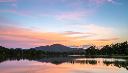 Obraz premium Serene sunset over a lake
