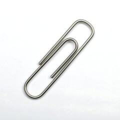 Single paperclip on white background