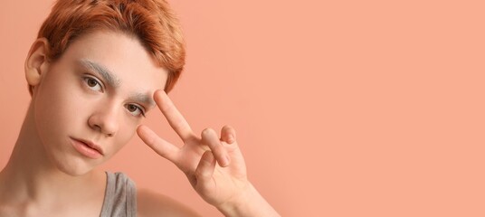 Non-binary teenager on color background with space for text. LGBT concept