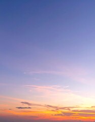 Soft sunset hues on a hazy sky